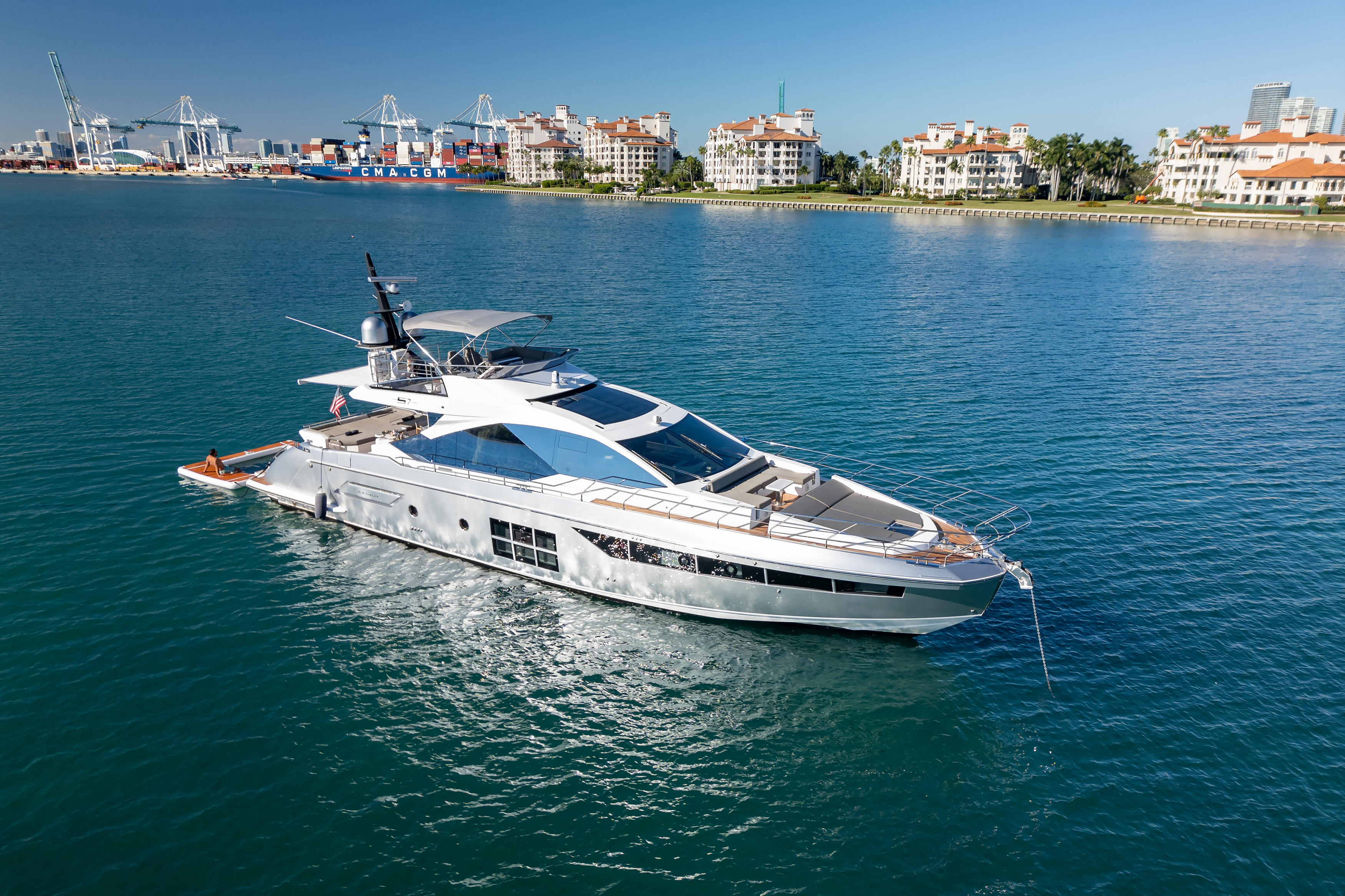 72ft Azimut S7 yacht with Miami skyline at sunset
