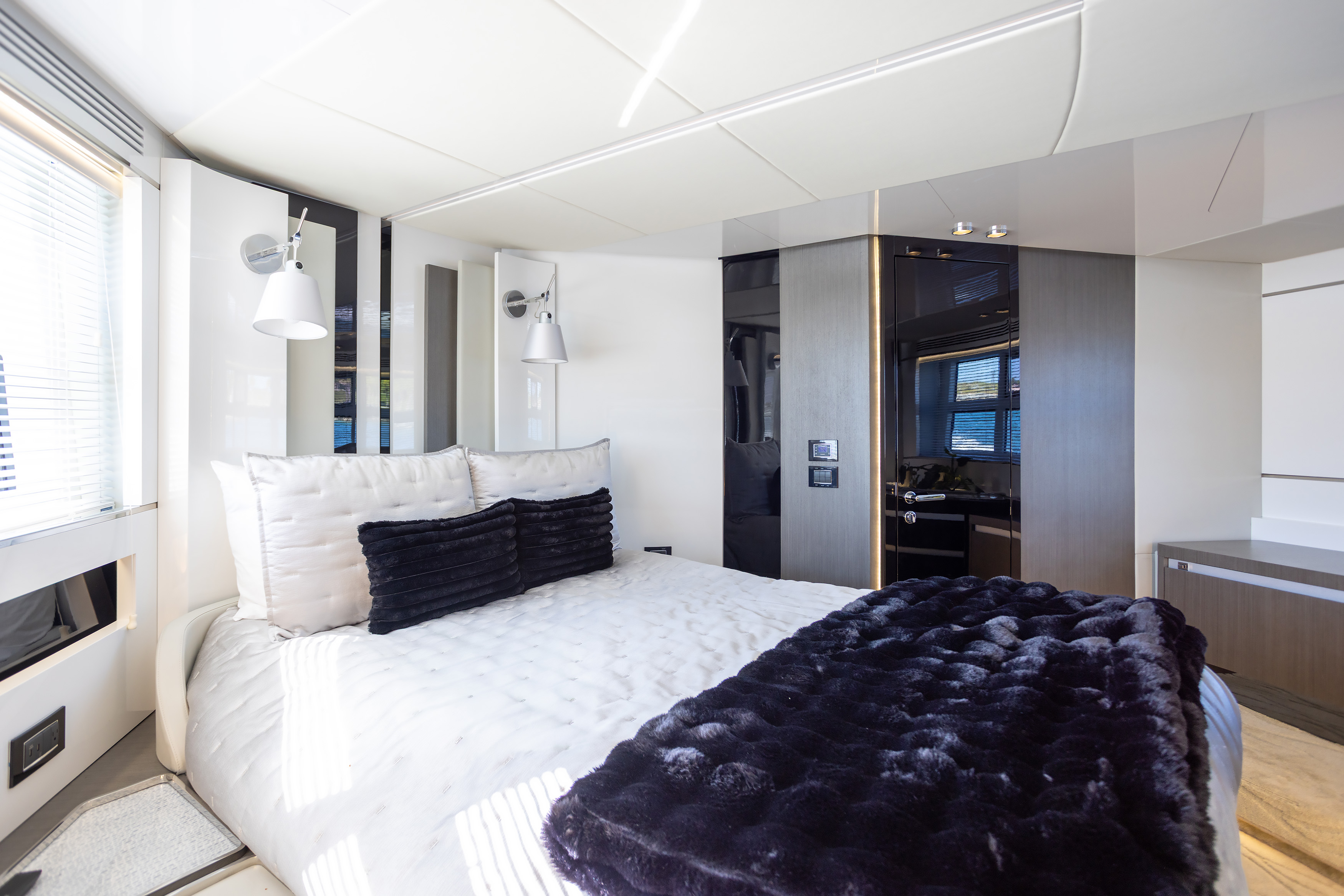 Master stateroom with walk-in closet and ambient lighting