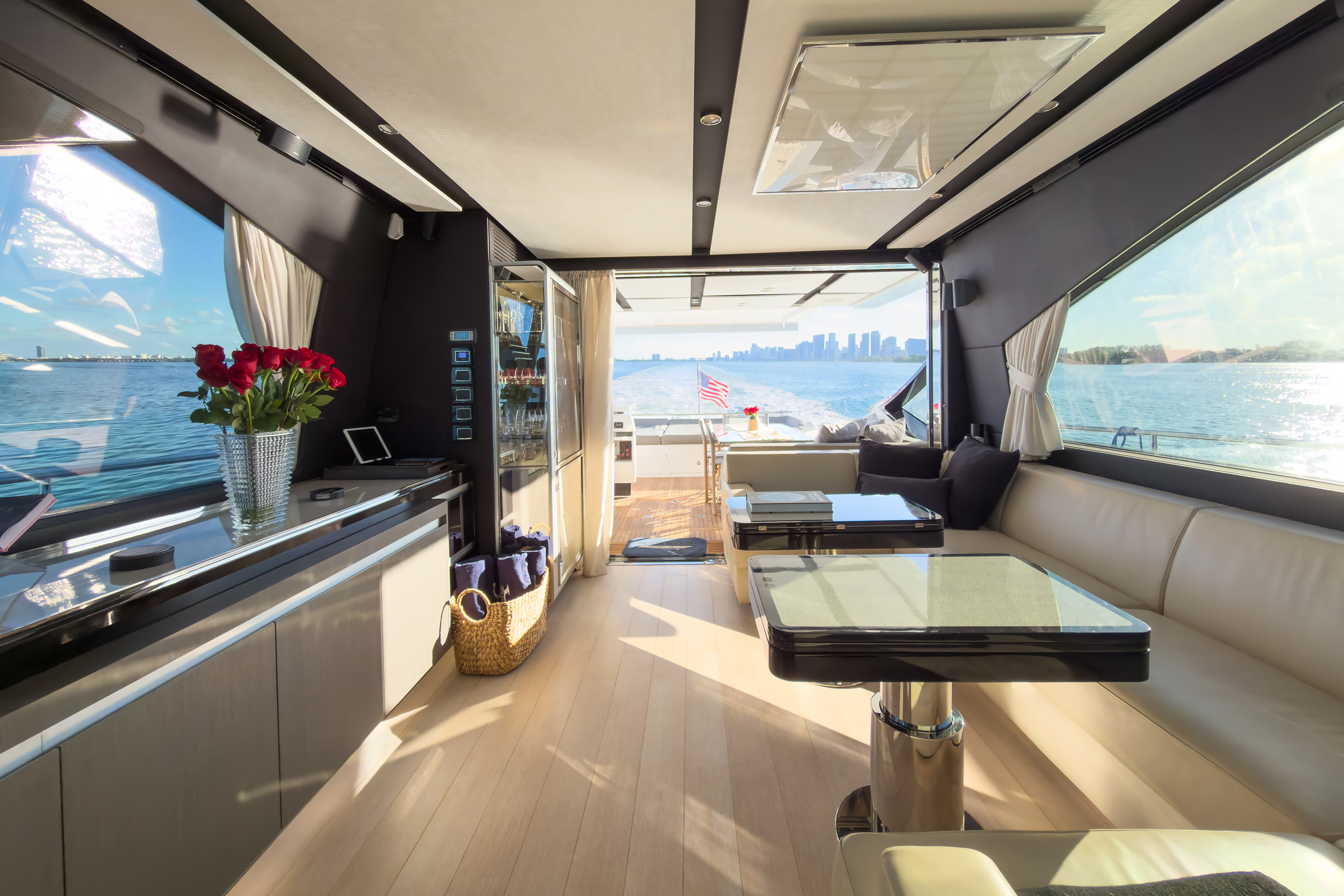 Galley and salon looking aft with roses and American flag