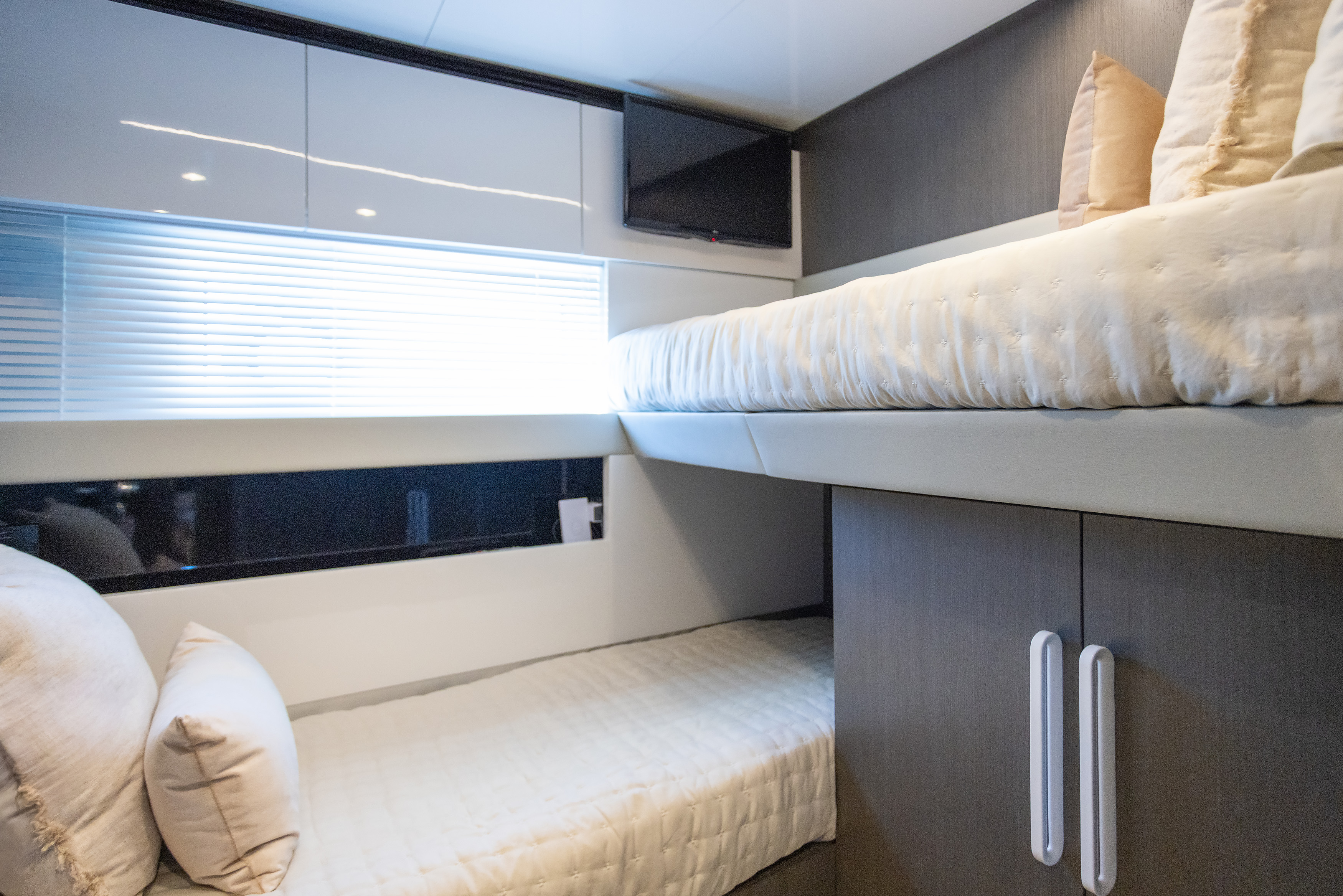 Guest cabin with bunk beds, TV and window